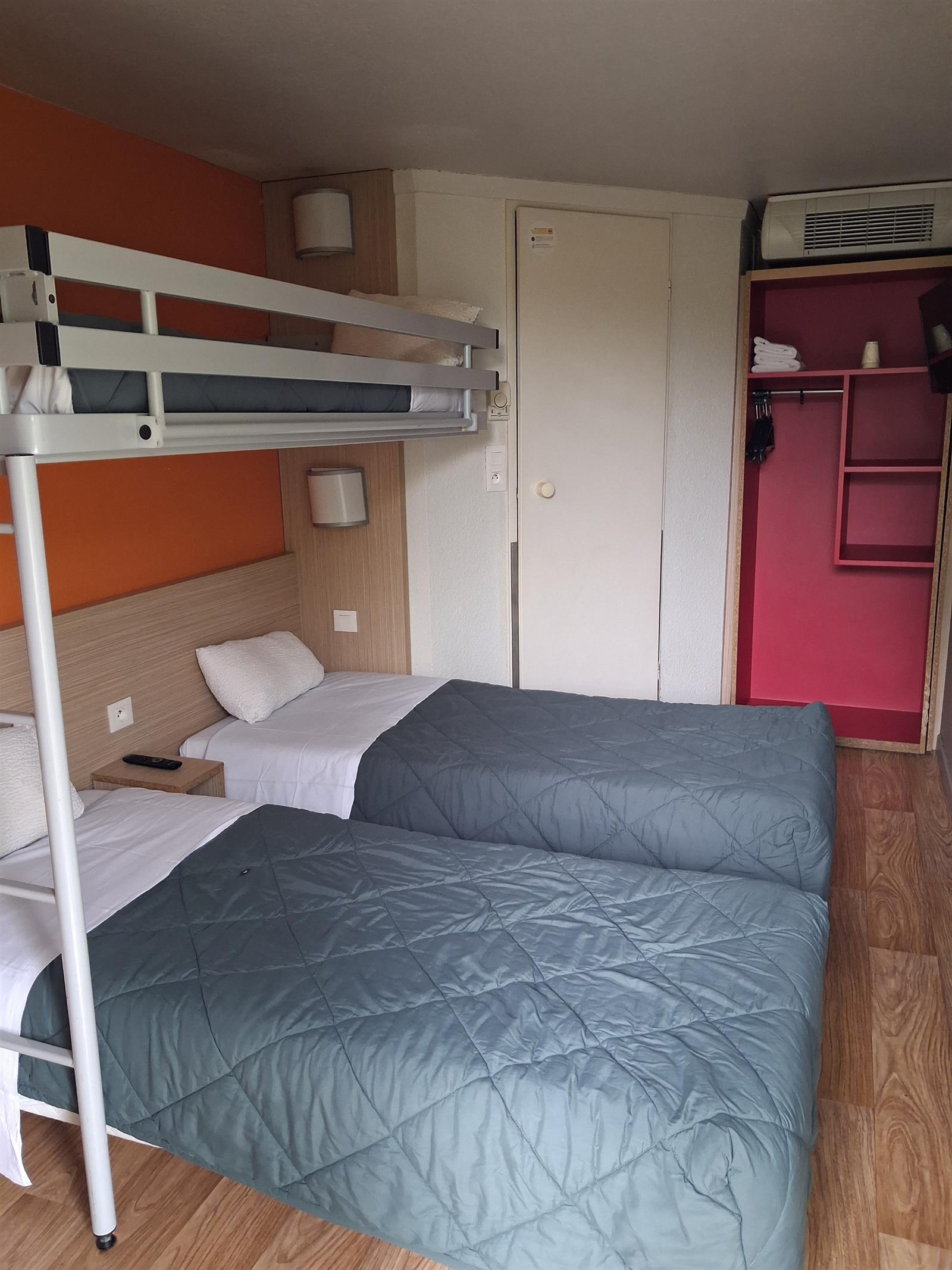 Chambre 3 lits simples